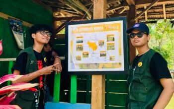 Mudahkan Wisatawan Explor Geopark, KKN-TK 20 Universitas Bojonegoro Pasang Peta Wisata Geopark Negeri Atas Angin